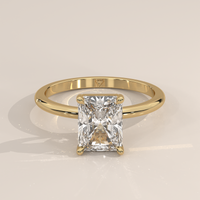 Classic Solitaire in 14k Yellow Gold with a radiant cut diamond