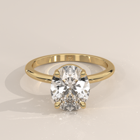 Classic Solitaire in 14k Yellow Gold with a oval cut diamond