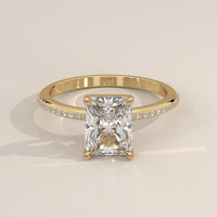 Pavé Band Solitaire in 14k Yellow Gold with a radiant cut diamond