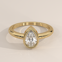 Bezel Solitaire in 14k Yellow Gold with a pear cut diamond