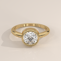 Bezel Solitaire in 14k Yellow Gold with a round cut diamond