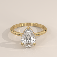 Classic Solitaire in 14k Yellow Gold with a pear cut diamond