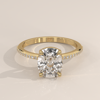 Pavé Band Solitaire in 14k Yellow Gold with a cushion cut diamond